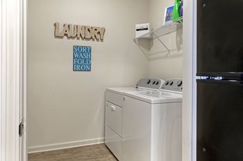Laundry room with a washer and dryer.